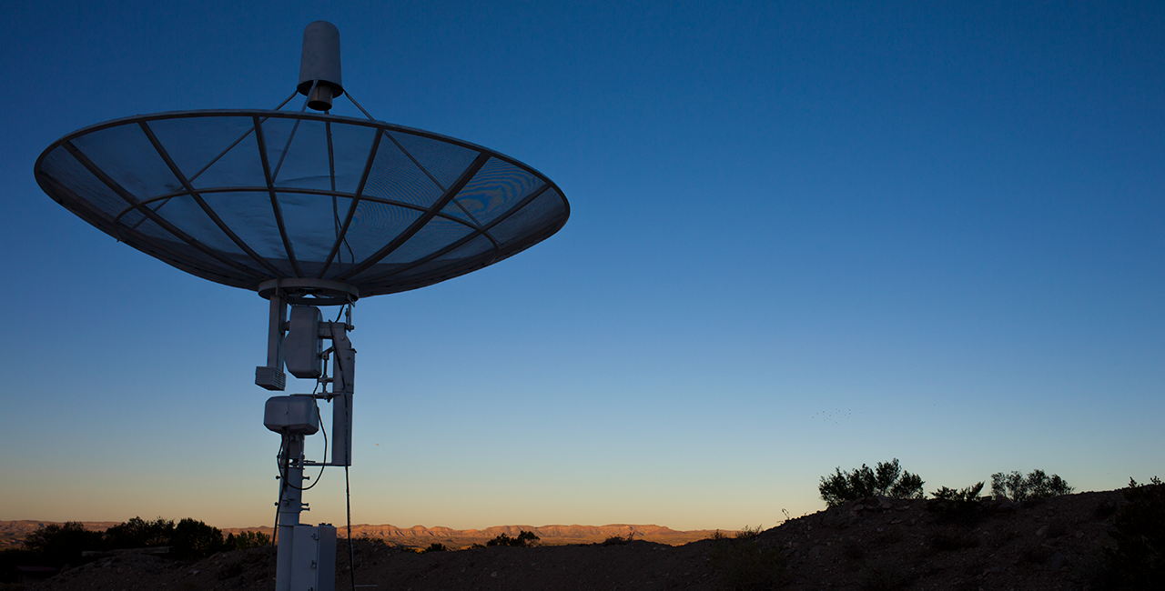 Image of radio satellite dish at sunset